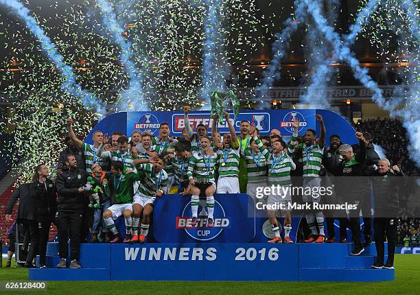 The Celtic team pose after winning the Betfred Cup Final between Aberdeen FC and Celtic FC at Hampden Park on November 27, 2016 in Glasgow, Scotland.