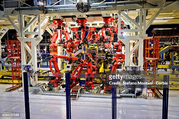 Robot stands in the Body Shop where they assemble the Alfa Romeo Giulia in the Cassino Assembly Plant FCA Group. This is the most highly-automated...