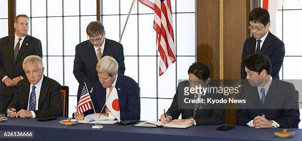 Japan - U.S. Defense Secretary Chuck Hagel, U.S. Secretary of State John Kerry, Japanese Foreign Minister Fumio Kishida and Japanese Defense Minister...