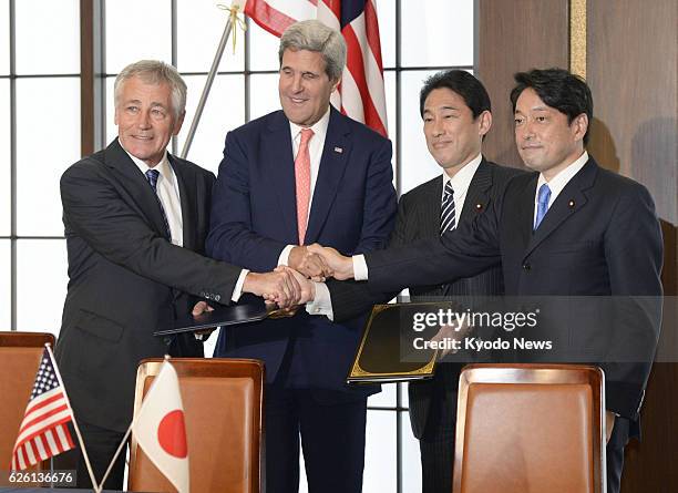 Japan - U.S. Defense Secretary Chuck Hagel, U.S. Secretary of State John Kerry, Japanese Foreign Minister Fumio Kishida and Japanese Defense Minister...