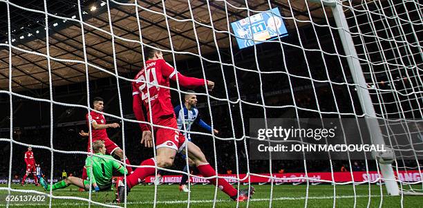 Berlin's Bosnian forward Vedad Ibisevic score his second goal during the German first division Bundesliga football match between Hertha BSC and 1 FSV...