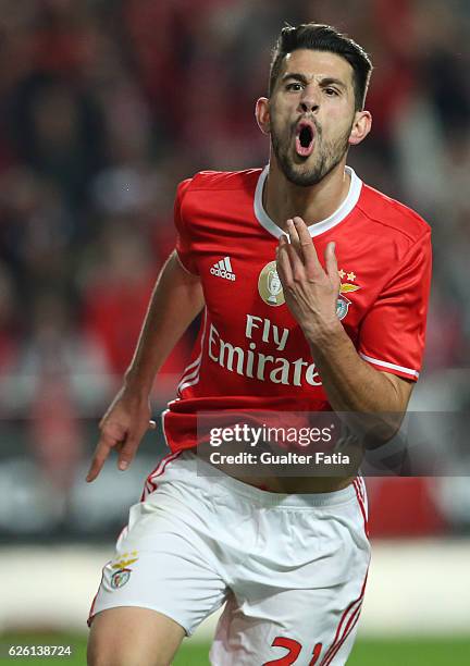 Benfica's midfielder Pizzi celebrates after scoring a goal during the Primeira Liga match between SL Benfica and Moreirense FC at Estadio da Luz on...