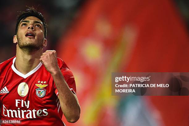 Benfica's Mexican forward Raul Jimenez celebrates after scoring during the Portuguese league football match SL Benfica vs Moreirense FC at the Luz...