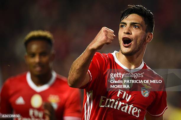 Benfica's Mexican forward Raul Jimenez celebrates after scoring during the Portuguese league football match SL Benfica vs Moreirense FC at the Luz...