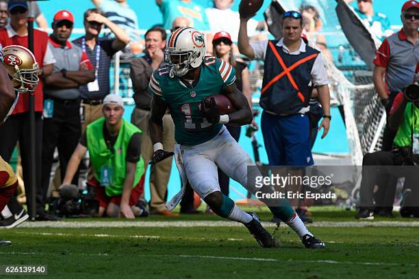 DeVante Parker of the Miami Dolphins runs after a catch during the 2nd quarter against the San Francisco 49ers at Hard Rock Stadium on November 27,...