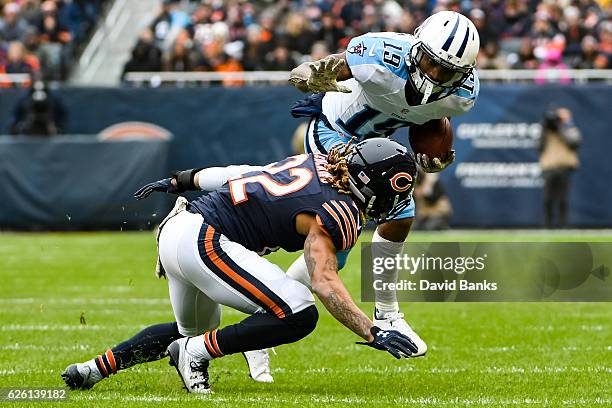 Tajae Sharpe of the Tennessee Titans carries the football against Cre'von LeBlanc of the Chicago Bears in the first quarter at Soldier Field on...