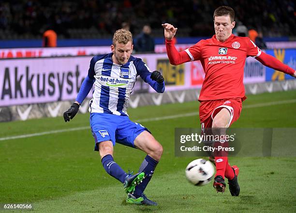 Fabian Lustenberger of Hertha BSC and GaÃ«tan Bussmann of FSV Mainz 05 during the game between Hertha BSC and Mainz 05 on november 27, 2016 in...