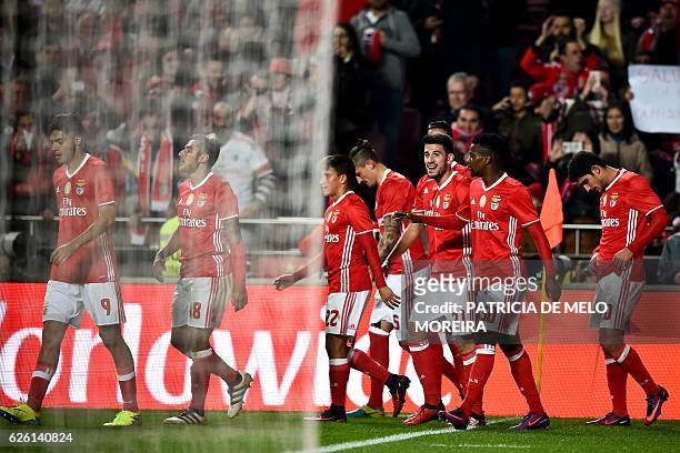 Benfica's midfielder Pizzi Fernandes celebrates after scoring during the Portuguese league football match SL Benfica vs Moreirense FC at the Luz...