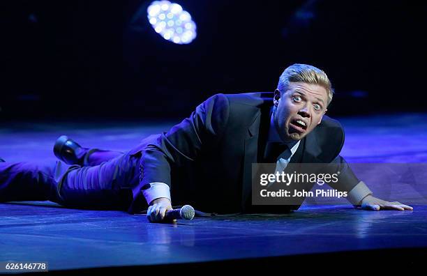 Rob Beckett performs on stage during Absolute Radio Live in aid of Macmillan Cancer Support at the London Palladium on November 27, 2016 in London,...