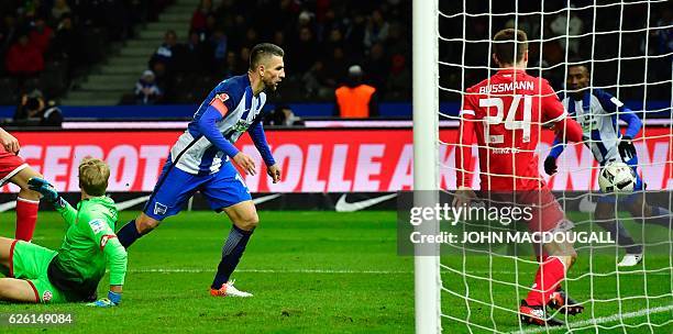 Berlin's Bosnian forward Vedad Ibisevic scores his second goal during the German first division Bundesliga football match between Hertha BSC and 1...