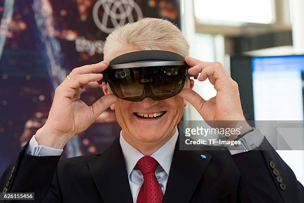 Heinrich Hiesinger, CEO of ThyssenKrupp AG with a 3D glasses, HoloLens from Microsoft on the ThyssenKrupp AG press conference on November 24, 2016 in...