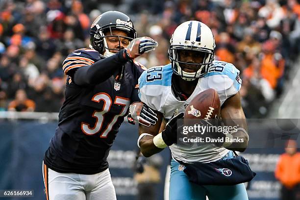 Harry Douglas of the Tennessee Titans carries the football ahead of Bryce Callahan of the Chicago Bears in the third quarter at Soldier Field on...