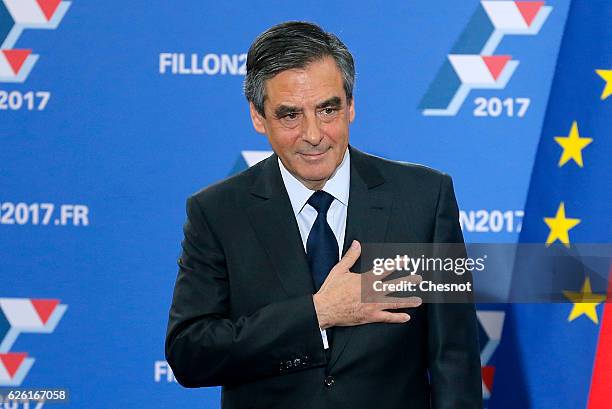 Former French Prime Minister and candidate for the right-wing party 'Les Republicains' , Francois Fillon gestures toward the audience after his...