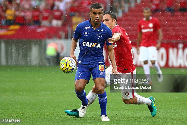 Seijas of Internacional battles for the ball against Alisson of Cruzeiro during the match between Internacional and Cruzeiro as part of Brasileirao...