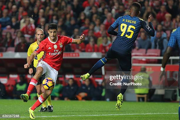 Benficas forward Raul Jimenez from Mexico with Moreirenses defender Pierre Sagna during Premier League 2016/17 match between SL Benfica and...