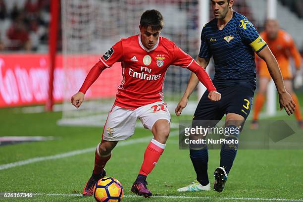 Benficas forward Franco Cervi from Argentina with Moreirenses defender Tiago Almeida during Premier League 2016/17 match between SL Benfica and...