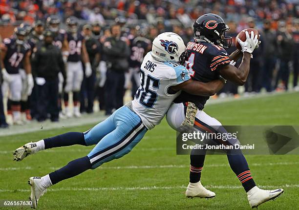 Deonte Thompson of the Chicago Bears makes a catch in front of LeShaun Sims of the Tennessee Titans at Soldier Field on November 27, 2016 in Chicago,...