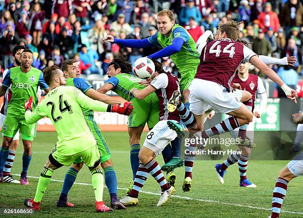 Chad Marshall of Seattle Sounders watches as a header off a corner is directed wide by Axel Sjoberg of Colorado Rapids during the first half at...