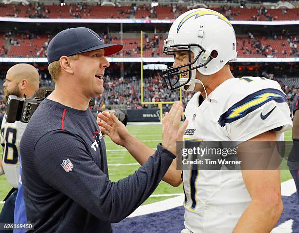 Brandon Weeden of the Houston Texans greets Philip Rivers of the San Diego Chargers after the game at NRG Stadium on November 27, 2016 in Houston,...