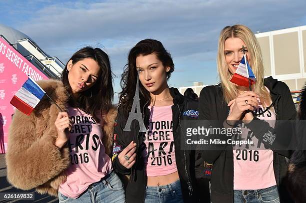 Victoria's Secret models Kendall Jenner, Bella Hadid and Lily Donaldson depart for Paris for the 2016 Victoria's Secret Fashion Show on November 27,...
