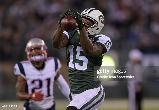 New York Jets Wide Receiver Brandon Marshall beats New England Patriots Cornerback Malcolm Butler for the completion during the NY Jets vs New...