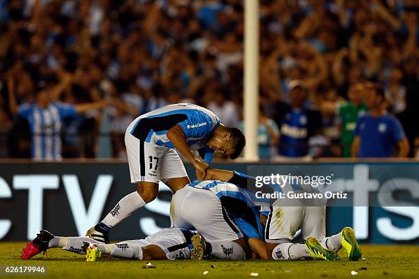 Lisandro Lopez of Racing Club celebrates after scoring the third goal of his team during a match between Racing Club and Independiente as part of...