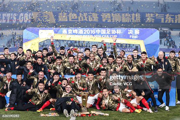 Guangzhou Evergrande Taobao Football Club celebrate after winning Jiangsu Suning Football Club during the final second leg of Yanjing Beer 2016...