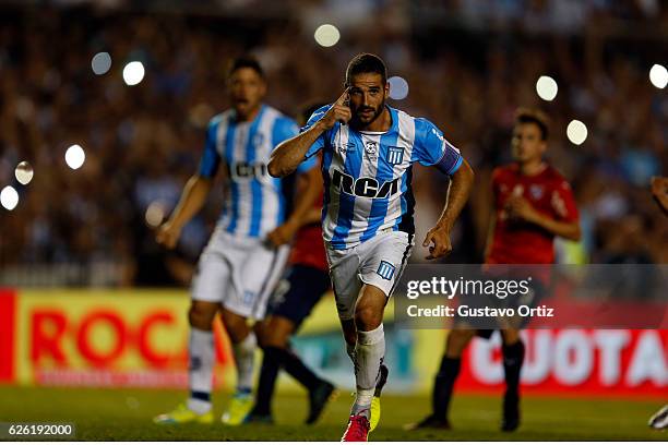 Lisandro Lopez of Racing Club celebrates after scoring the third goal of his team during a match between Racing Club and Independiente as part of...