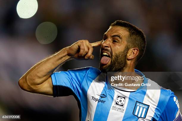 Lisandro Lopez of Racing Club celebrates after scoring the third goal of his team during a match between Racing Club and Independiente as part of...