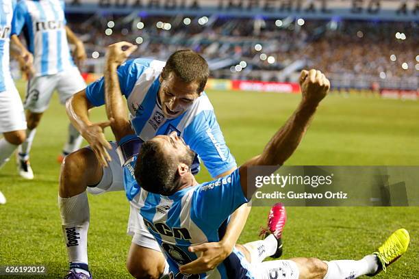 Lisandro Lopez of Racing Club celebrates after scoring the third goal of his team during a match between Racing Club and Independiente as part of...