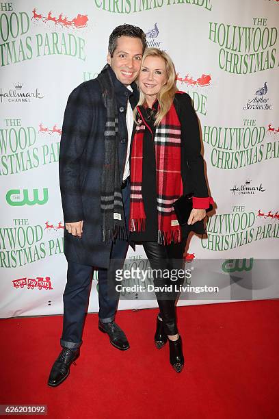 Actors Dominique Zoida and Katherine Kelly Lang arrive at the 85th Annual Hollywood Christmas Parade on November 27, 2016 in Hollywood, California.