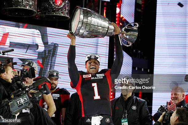 Ottawa Redblacks Henry Burris hoist the cup after his team won the Grey Cup over the Calgary Stampeders at BMO field in Toronto on November 27, 2016.