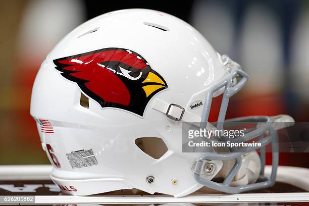 An Arizona Cardinals helmet sits on an equipment case prior to an NFL football game between the Arizona Cardinals and the Atlanta Falcons on November...