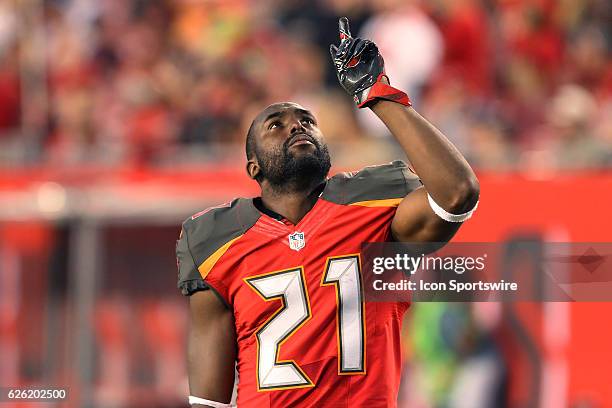 Alterraun Verner of the Buccaneers looks up to the skies to thank God and in remembrance of his father who died the day before the game during the...