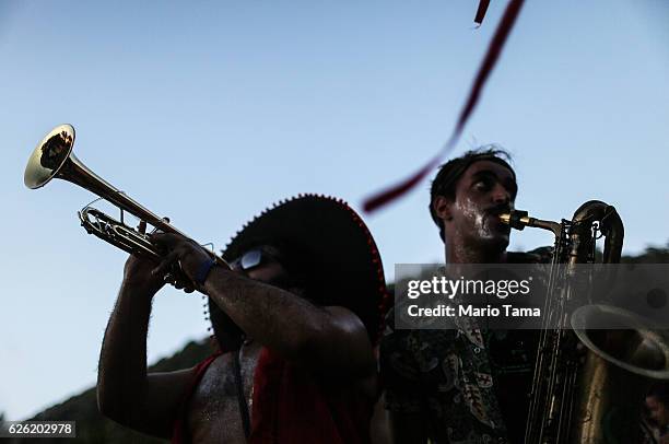 Musicians perform during the 2016 Honk! Rio Festival, a celebration of brass bands, on November 27, 2016 in Rio de Janeiro, Brazil. The four-day...