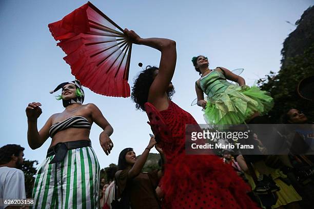 Dancers perform during the 2016 Honk! Rio Festival, a celebration of brass bands, on November 27, 2016 in Rio de Janeiro, Brazil. The four-day...