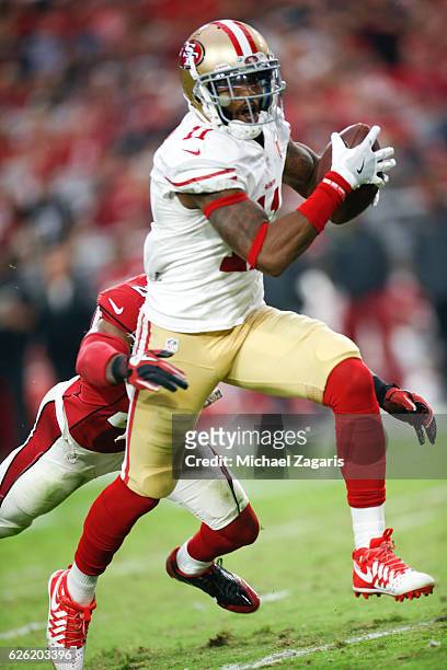 Quinton Patton of the San Francisco 49ers runs after making a reception during the game against the Arizona Cardinals at the University of Phoenix...