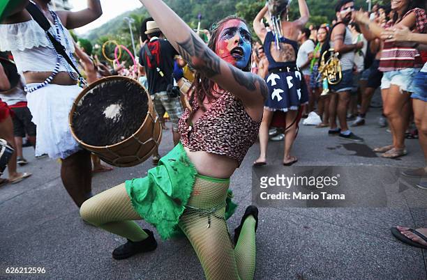 Performers dance during the 2016 Honk! Rio Festival, a celebration of brass bands, on November 27, 2016 in Rio de Janeiro, Brazil. The four-day...