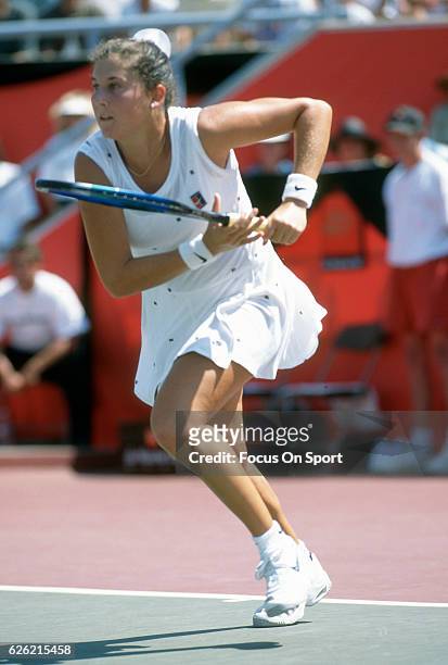 Monica Seles of Yugoslavia in action during a women's singles match at the Du Maurier Canadian Open circa 1995 at the Jarry Stadium in Montreal,...