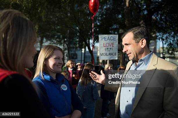 San Jose Mayor Sam Liccardo talks to Mary Clare Bernal, one of the organizers of a &quot;Love Trumps Hate&quot; march in downtown San Jose on...