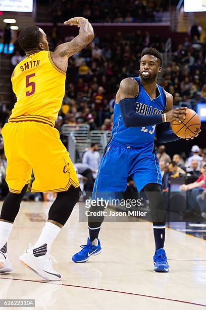 Smith of the Cleveland Cavaliers guards Wesley Matthews of the Dallas Mavericks during the first half at Quicken Loans Arena on November 25, 2016 in...