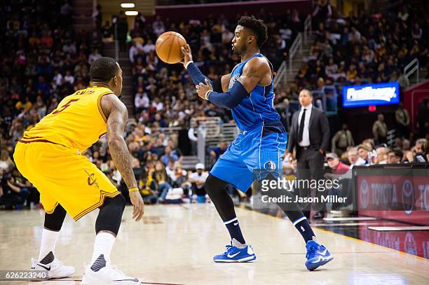 Smith of the Cleveland Cavaliers guards Wesley Matthews of the Dallas Mavericks during the first half at Quicken Loans Arena on November 25, 2016 in...