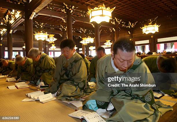 Buddhist monks chant with their heads shaking, during the Ho-On-Ko, memorial service to commemorate Shinran, founder of their Buddhist sect Jodo...