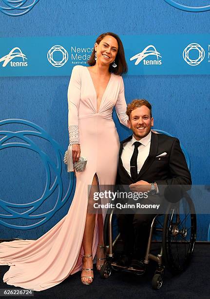 Dylan Alcott and girlfriend Kate Lawrance pose as they arrive ahead of the 2016 Newcombe Medal at Crown Palladium on November 28, 2016 in Melbourne,...