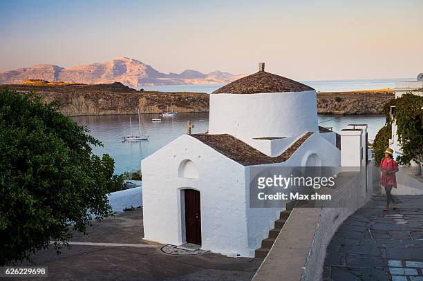 st george's chapel at the lindos, rhodes, greece. - rhodes,_new_south_wales stock pictures, royalty-free photos & images