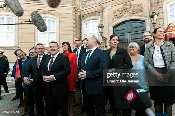 Prime Minister Lars Lokke Rasmussen with his new team of ministers meet the press outside Amalienborg after having presented his new coalition...