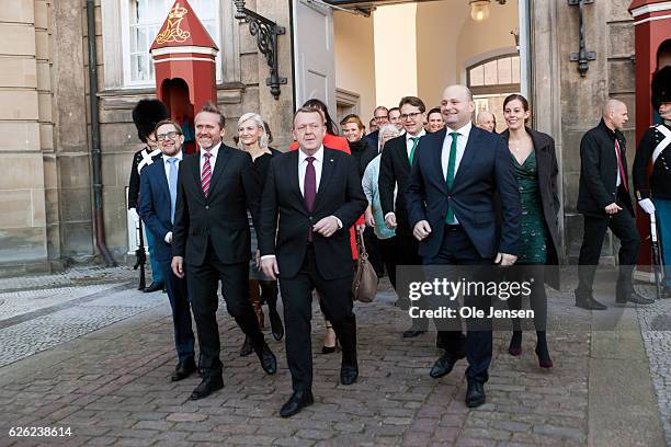 Prime Minister Lars Lokke Rasmussen with his new team of ministers meet the press outside Amalienborg after having presented his new coalition...