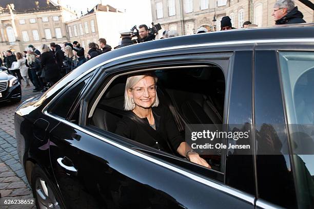 Ministers in the new Danish coalition government arrive - here Ulla Tornaes Venstre, read:The liberal Party), from today Minister for Development...