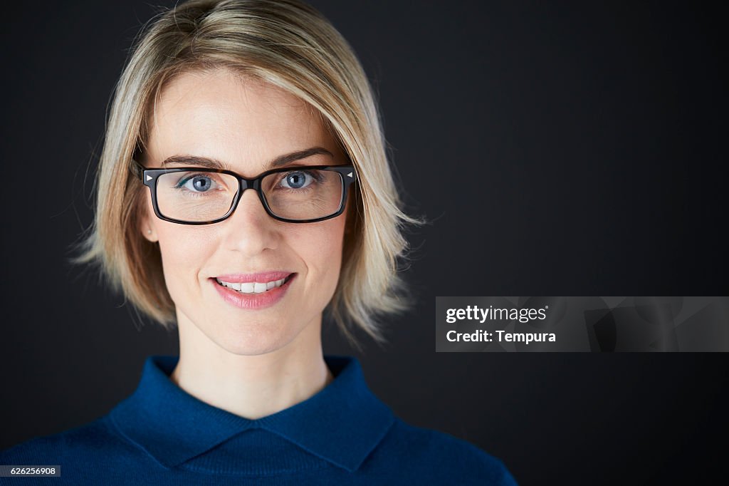 Woman headshot looking at camera.