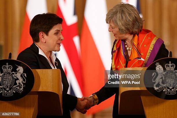 British Prime Minister Theresa May and Polish Prime Minister Beata Szydlo hold a joint press conference at 10 Downing Street on November 28, 2016 in...